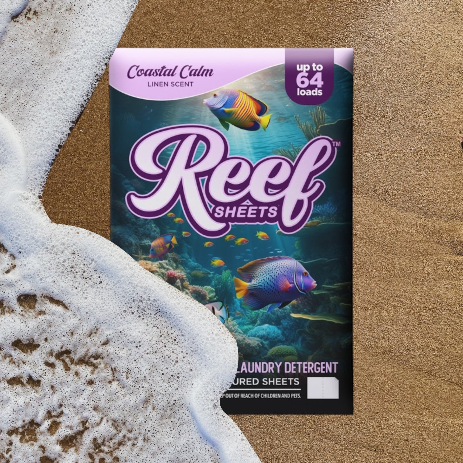 A box of Reef Sheets Coastal Calm laundry detergent sheets with a linen scent, featuring an image of colorful fish and coral underwater.